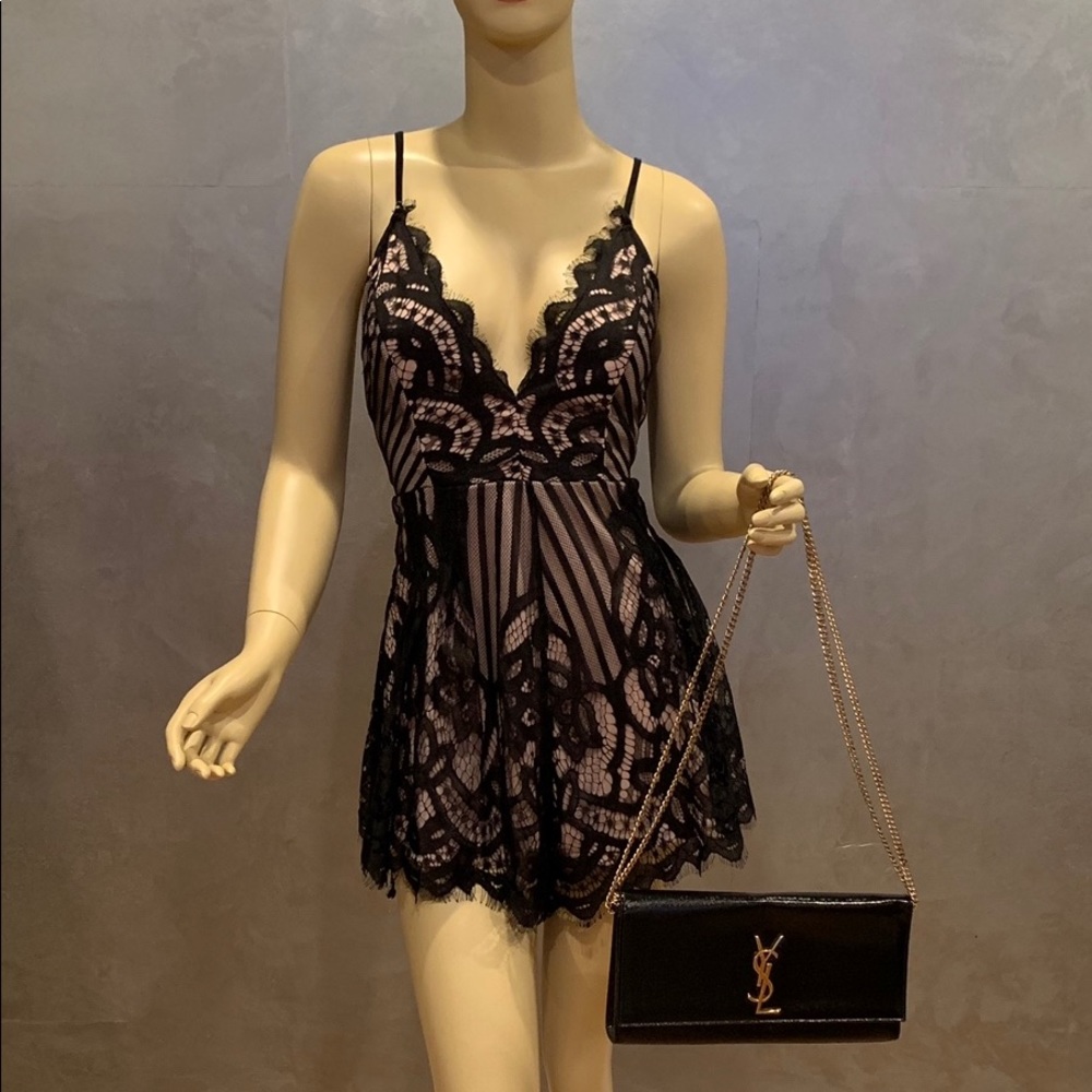Sexy black & nude lace romper.
